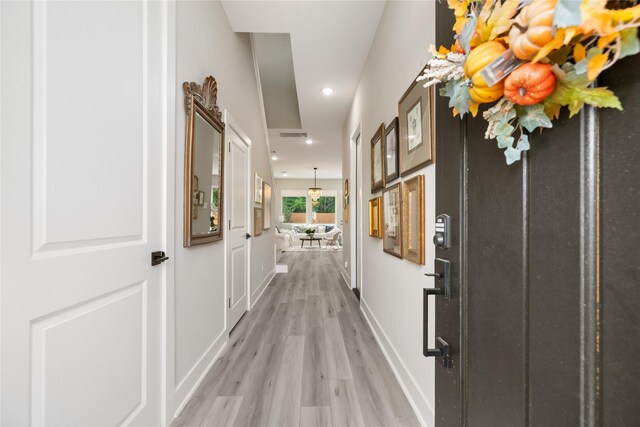 4926 Wunder Way, Houston, TX 77069 - hallway featuring light wood finished floors, baseboards, and recessed lighting