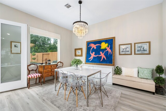 4926 Wunder Way, Houston, TX 77069 - dining space featuring a chandelier and wood finished floors