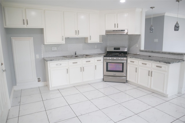 14145 Force St, Houston, TX 77015 - kitchen with stainless steel gas stove, a sink, baseboards, light stone countertops, and decorative backsplash