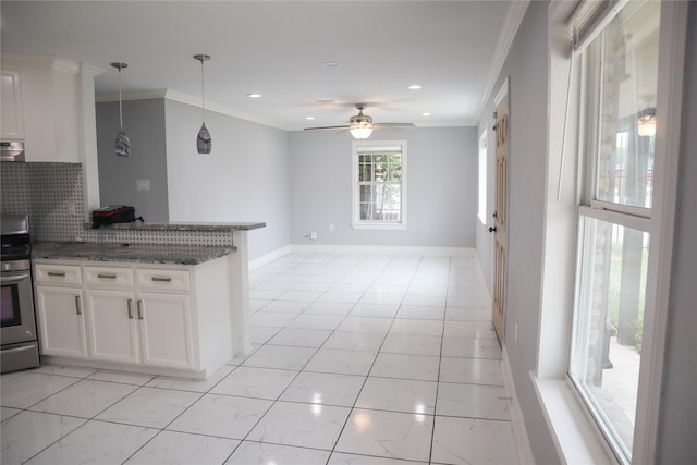 14145 Force St, Houston, TX 77015 - kitchen with stainless steel range oven, white cabinets, decorative backsplash, recessed lighting, and a peninsula