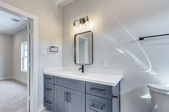 5407 Lee St, Houston, TX 77020 - bathroom with vanity, toilet, and baseboards