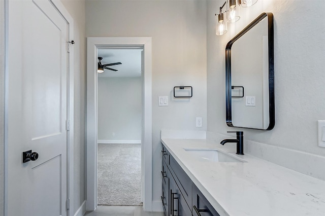 5407 Lee St, Houston, TX 77020 - bathroom featuring vanity, ceiling fan, and baseboards