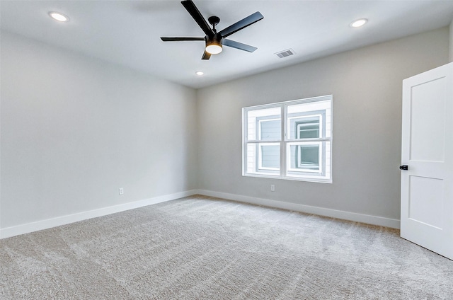 5407 Lee St, Houston, TX 77020 - carpeted empty room featuring a ceiling fan, baseboards, and recessed lighting