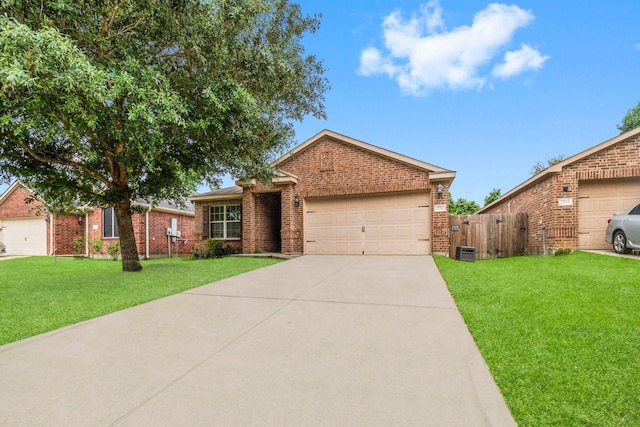 12218 Estelle Ln, Pinehurst, TX 77362 - ranch-style home featuring brick siding, a garage, concrete driveway, and a gate