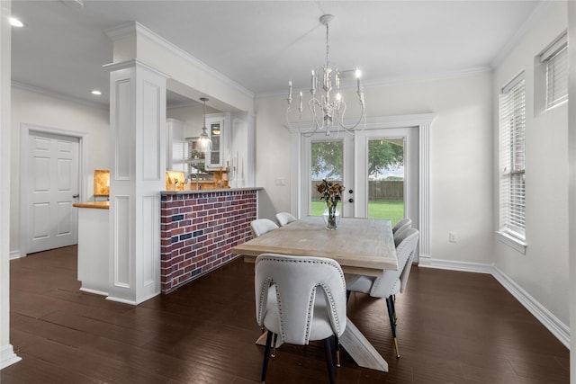 12219 W River Run Dr, Baytown, TX 77523 - dining room with healthy amount of natural light, a chandelier, dark wood-style floors, ornamental molding, and recessed lighting