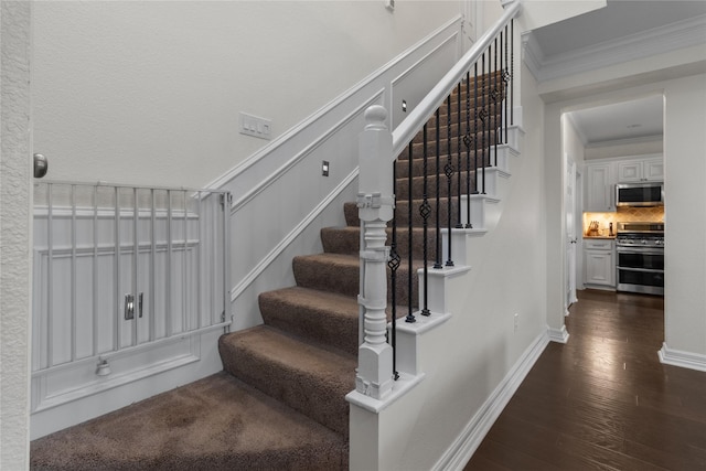 12219 W River Run Dr, Baytown, TX 77523 - stairs featuring wood finished floors and ornamental molding