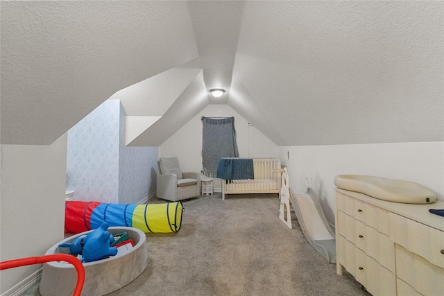 12219 W River Run Dr, Baytown, TX 77523 - carpeted bedroom with a textured ceiling and vaulted ceiling