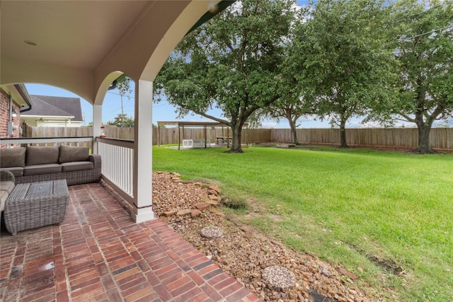 12219 W River Run Dr, Baytown, TX 77523 - fenced backyard featuring an outdoor hangout area and a patio area