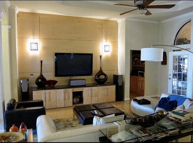 2217 W Reata Dr, Deer Park, TX 77536 - living area featuring a ceiling fan and crown molding