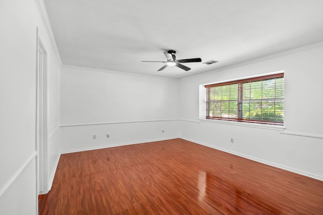 3602 Highland Lakes Dr, Kingwood, TX 77339 - spare room featuring ceiling fan, wood finished floors, ornamental molding, and baseboards