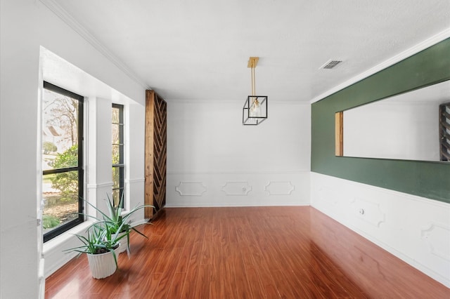3602 Highland Lakes Dr, Kingwood, TX 77339 - empty room featuring wood finished floors, ornamental molding, and baseboards