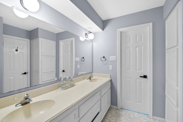 3602 Highland Lakes Dr, Kingwood, TX 77339 - bathroom with double vanity and baseboards