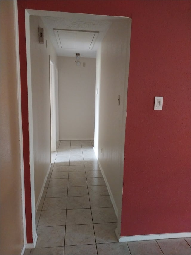2450 Edgedale Dr, Missouri City, TX 77489 - hall with attic access and light tile patterned floors
