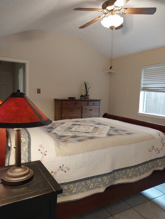 2450 Edgedale Dr, Missouri City, TX 77489 - tiled bedroom with lofted ceiling