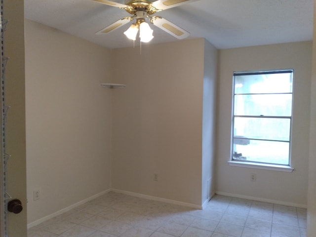 2450 Edgedale Dr, Missouri City, TX 77489 - spare room with light tile patterned flooring and a ceiling fan