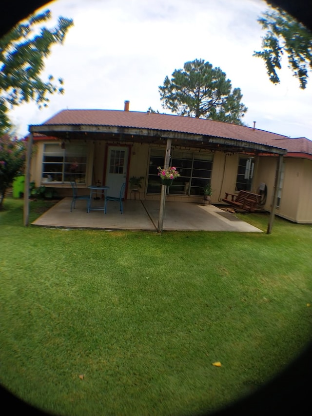 2450 Edgedale Dr, Missouri City, TX 77489 - back of property with a patio and a lawn