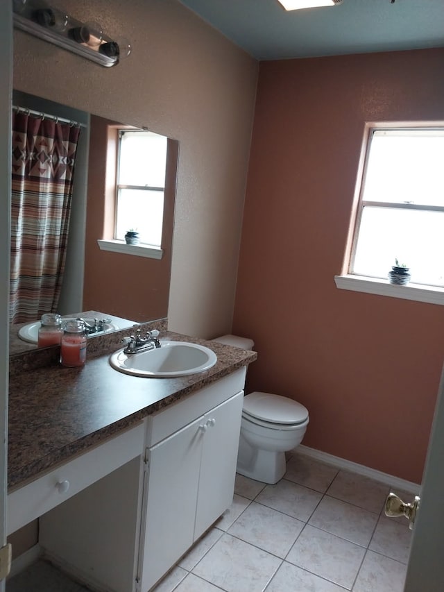2450 Edgedale Dr, Missouri City, TX 77489 - full bathroom with vanity, plenty of natural light, and tile patterned flooring