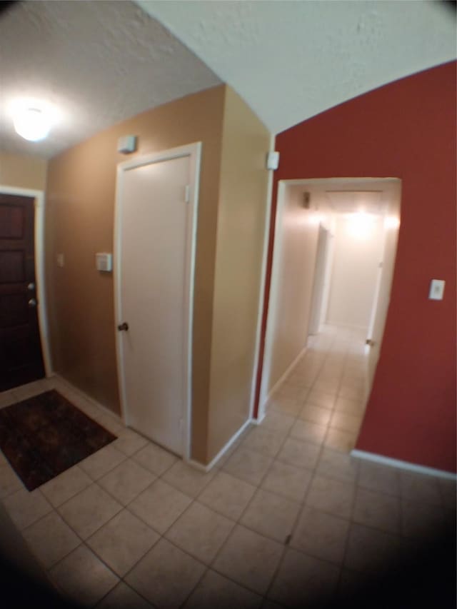 2450 Edgedale Dr, Missouri City, TX 77489 - hall featuring baseboards and light tile patterned floors