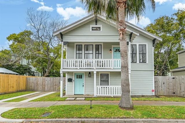 1715 30th St, Galveston, TX 77550 - view of front of home with a porch and a balcony