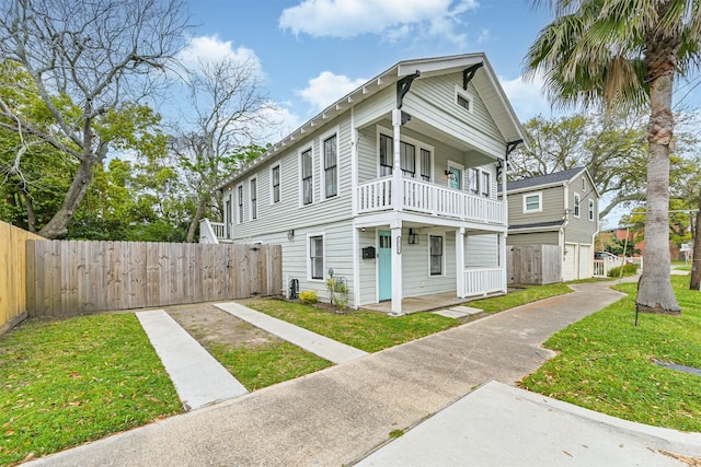 1715 30th St, Galveston, TX 77550 - view of front of home with a balcony