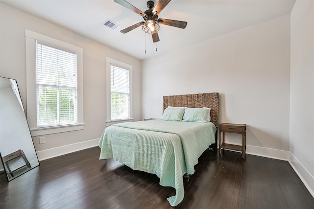 1715 30th St, Galveston, TX 77550 - bedroom featuring wood finished floors, baseboards, and a ceiling fan