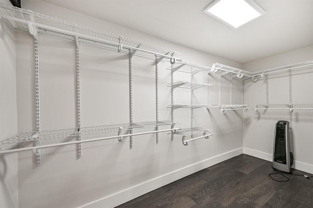 1715 30th St, Galveston, TX 77550 - walk in closet featuring heating unit and dark wood-style floors