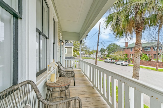 1715 30th St, Galveston, TX 77550 - covered porch with a residential view