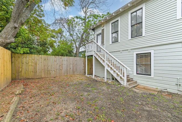 1715 30th St, Galveston, TX 77550 - fenced backyard featuring stairs