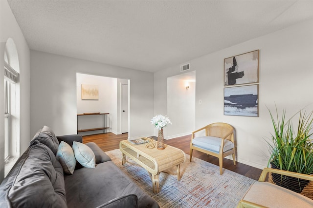 8101 Amelia Rd Unit 106, Houston, TX 77055 - living room with baseboards and wood finished floors