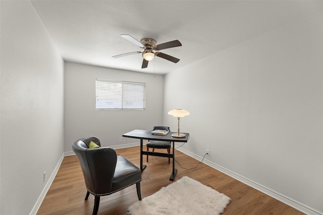 8101 Amelia Rd Unit 106, Houston, TX 77055 - office with a ceiling fan, baseboards, and wood finished floors