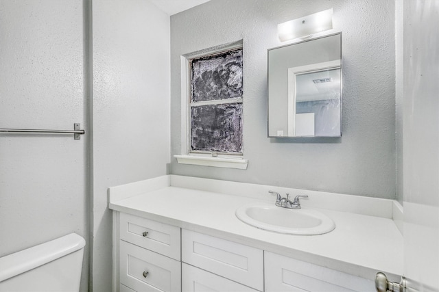 1323 W Donovan St, Houston, TX 77091 - bathroom featuring vanity and toilet