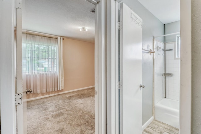 1323 W Donovan St, Houston, TX 77091 - bathroom with baseboards and shower / tub combination