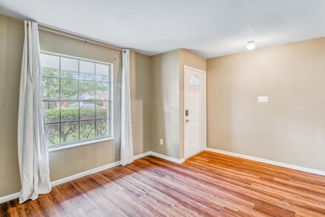 1323 W Donovan St, Houston, TX 77091 - spare room with wood finished floors and plenty of natural light