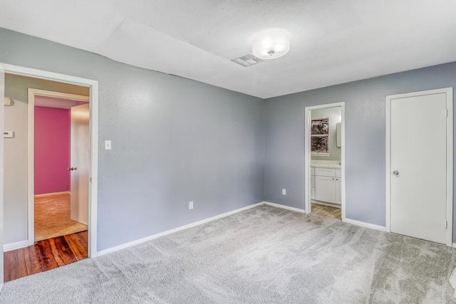 1323 W Donovan St, Houston, TX 77091 - unfurnished bedroom with carpet and connected bathroom