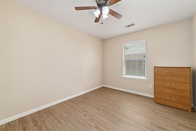 8123 Solara Bnd, Houston, TX 77083 - unfurnished bedroom with light wood-type flooring, baseboards, and ceiling fan