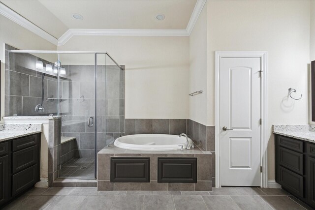 6013 Kansas St Unit B, Houston, TX 77007 - full bathroom featuring vanity, a bath, a shower stall, ornamental molding, and tile patterned flooring