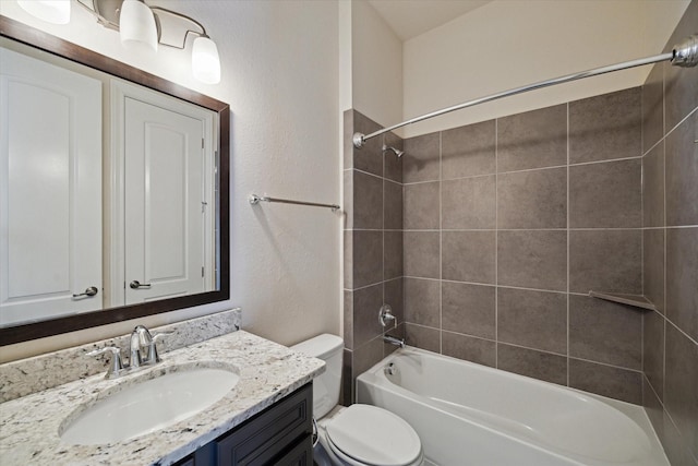 6013 Kansas St Unit B, Houston, TX 77007 - bathroom with vanity, toilet, shower / bathtub combination, and a textured wall