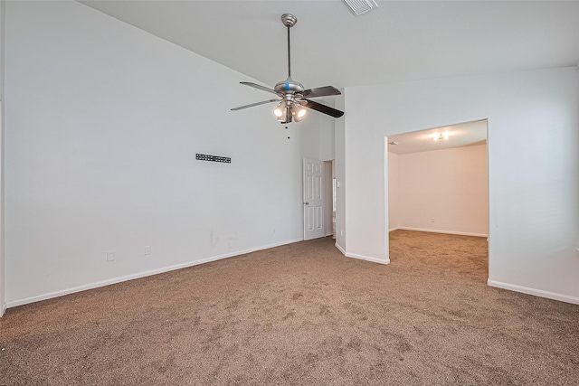 19826 Imperial Stone Dr, Houston, TX 77073 - carpeted empty room with vaulted ceiling, a ceiling fan, and baseboards