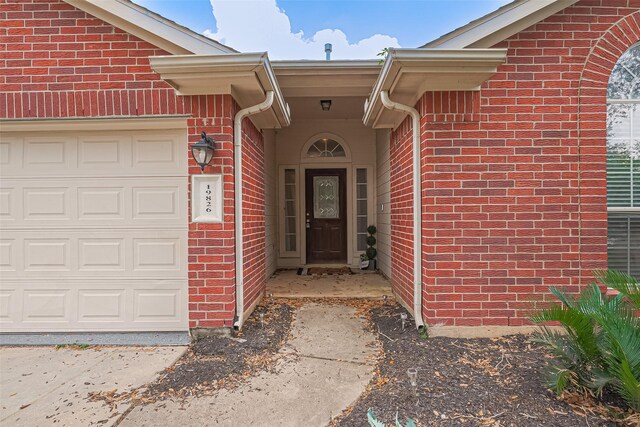 19826 Imperial Stone Dr, Houston, TX 77073 - entrance to property with an attached garage and brick siding