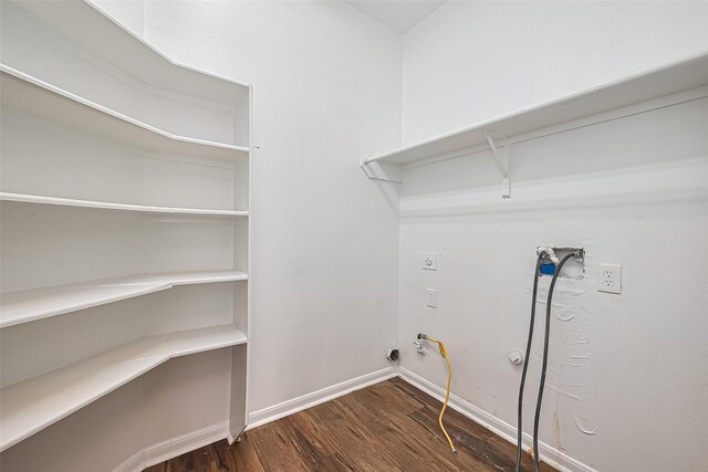 19826 Imperial Stone Dr, Houston, TX 77073 - laundry room featuring dark wood finished floors, baseboards, and hookup for a gas dryer