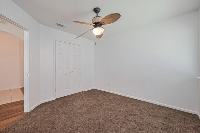 19826 Imperial Stone Dr, Houston, TX 77073 - unfurnished bedroom featuring a closet, baseboards, carpet, and arched walkways