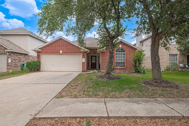 19826 Imperial Stone Dr, Houston, TX 77073 - view of front of property featuring an attached garage, driveway, and brick siding