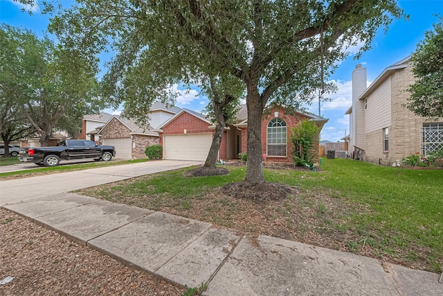 19826 Imperial Stone Dr, Houston, TX 77073 - view of front of home featuring driveway, an attached garage, a front yard, and brick siding