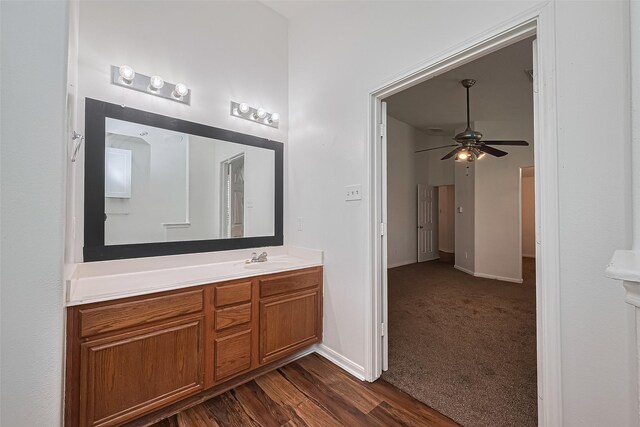 19826 Imperial Stone Dr, Houston, TX 77073 - bathroom with vanity, ceiling fan, baseboards, and wood finished floors