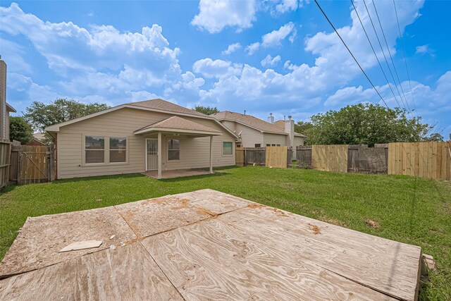 19826 Imperial Stone Dr, Houston, TX 77073 - back of house with a gate and a patio area