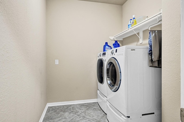9803 Clanton Pines Dr, Humble, TX 77396 - laundry room with independent washer and dryer, baseboards, and tile patterned flooring