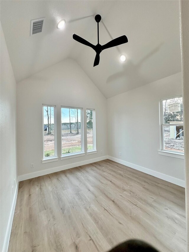 1031 Denson Allen Rd, Coldspring, TX 77331 - spare room with plenty of natural light, a ceiling fan, wood finished floors, baseboards, and lofted ceiling