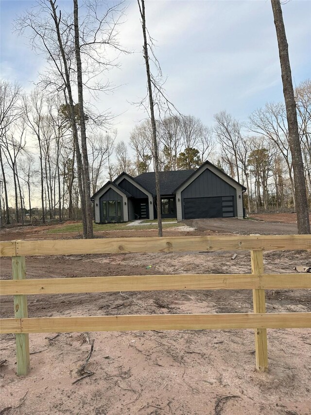 1031 Denson Allen Rd, Coldspring, TX 77331 - view of yard featuring driveway and an attached garage