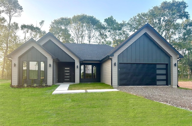 1031 Denson Allen Rd, Coldspring, TX 77331 - modern inspired farmhouse with board and batten siding, a front yard, a garage, driveway, and roof with shingles