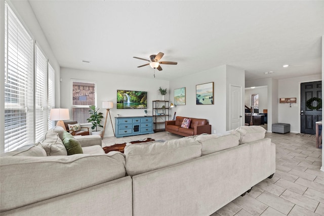 1435 Wheatley Hill Ln, Katy, TX 77494 - living area with ceiling fan, baseboards, and recessed lighting